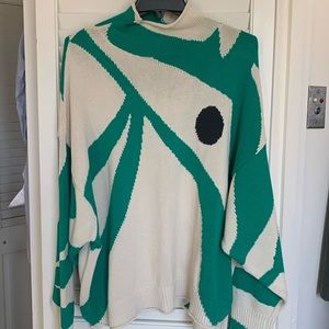 Crazy gorgeous marimekko sweater.  Hemline has vent.